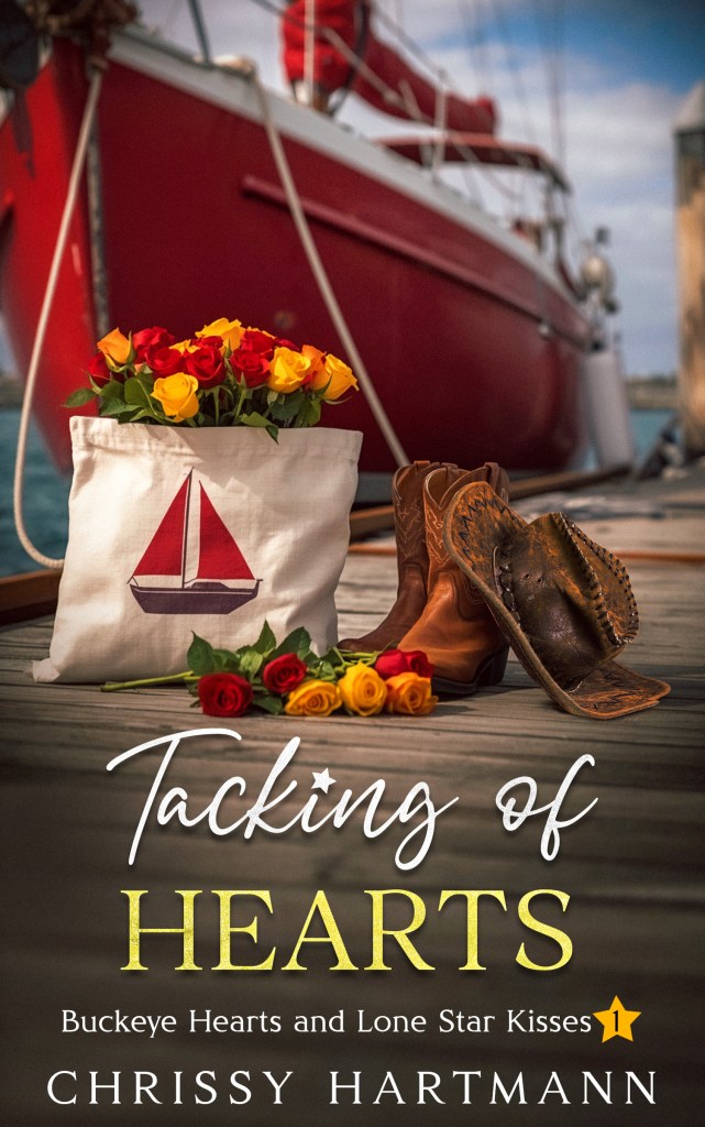 Tacking of Hearts book cover with sailboat moored at dock with rroses, cowboy hat and cowboy boots 